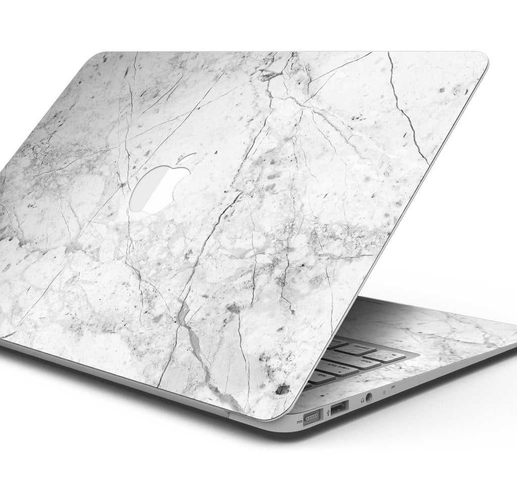 http://designskinz.com/cdn/shop/products/Cracked_Marble_Surface_MacBook_V1_1024x.jpg?v=1578634512