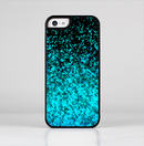 The Black and Turquoise Unfocused Sparkle Print Skin-Sert Case for the Apple iPhone 5c