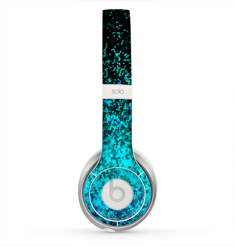 The Black and Turquoise Unfocused Sparkle Print Skin for the Beats by Dre Solo 2 Headphones