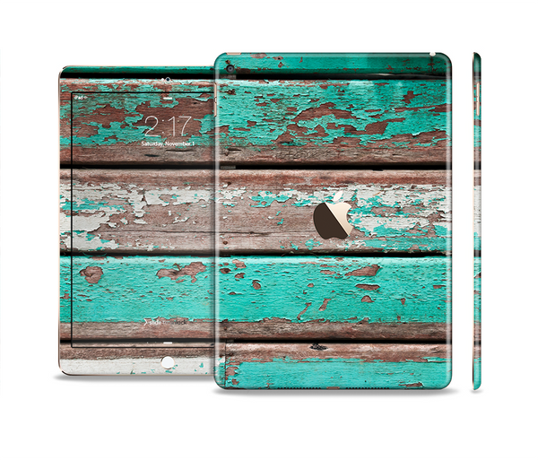 The Chipped Teal Paint On Wood Skin Set for the Apple iPad Pro