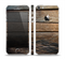 The Uneven Dark Wooden Planks Skin Set for the Apple iPhone 5