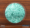 The Aqua Green Glimmer Skinned Foam-Backed Coaster Set