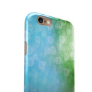 Abstract_Shaped_Sparkle_Unfocused_Blue_Green_-_iPhone_6s_-_Gold_-_Clear_Rubber_-_Hybrid_Case_-_Shopify_-_V5.jpg