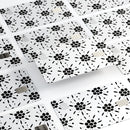 Black Floral Pedals with Clear Cacking - Premium Protective Decal Skin-Kit for the Apple Credit Card
