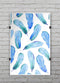 Blue_Watercolor_Feather_Pattern_PosterMockup_11x17_Vertical_V9.jpg