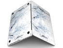 Blue_and_Black_Grunge_Over_White_Marble_Surface_-_13_MacBook_Pro_-_V3.jpg