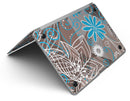Brown_Surface_with_Blue_and_White_Whymsical_Floral_Pattern_-_13_MacBook_Air_-_V3.jpg
