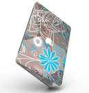 Brown_Surface_with_Blue_and_White_Whymsical_Floral_Pattern_-_13_MacBook_Pro_-_V2.jpg