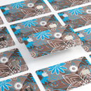 Brown Surface with Blue and White Whymsical Floral Pattern - Premium Protective Decal Skin-Kit for the Apple Credit Card