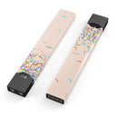 Colorful Candy Sticks Over Apricot - Premium Decal Protective Skin-Wrap Sticker compatible with the Juul Labs vaping device