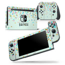 Colorful Falling Triangles Over Mint - Vinyl Skin Wrap for Nintendo Switch 2, OLED, Lite, Pro Controller, Wii & Classic Handhelds