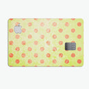 Coral Polka Dots Over Grunge Yellow - Premium Protective Decal Skin-Kit for the Apple Credit Card