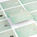 Faded Teal Snowflake Pattern - Premium Protective Decal Skin-Kit for the Apple Credit Card