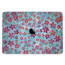 MacBook Pro with Touch Bar Skin Kit - Flowers_with_Stems_over_Light_Blue_Watercolor-MacBook_13_Touch_V3.jpg?