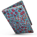 MacBook Pro with Touch Bar Skin Kit - Flowers_with_Stems_over_Light_Blue_Watercolor-MacBook_13_Touch_V6.jpg?
