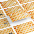 Grungy Orange Polka Dots Over Muted Coral - Premium Protective Decal Skin-Kit for the Apple Credit Card