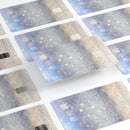 Light Blue and Tan Unfocused Orbs of Light - Premium Protective Decal Skin-Kit for the Apple Credit Card