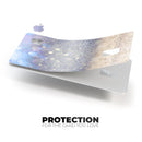 Light Blue and Tan Unfocused Orbs of Light - Premium Protective Decal Skin-Kit for the Apple Credit Card