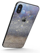 Light Blue and Tan Unfocused Orbs of Light - iPhone X Skin-Kit