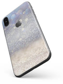 Light Blue and Tan Unfocused Orbs of Light - iPhone X Skin-Kit