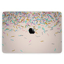 MacBook Pro with Touch Bar Skin Kit - Multicolor_Birth_Sprinkles_Over_Tan-MacBook_13_Touch_V3.jpg?