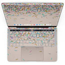 MacBook Pro with Touch Bar Skin Kit - Multicolor_Birth_Sprinkles_Over_Tan-MacBook_13_Touch_V4.jpg?