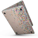 MacBook Pro with Touch Bar Skin Kit - Multicolor_Birth_Sprinkles_Over_Tan-MacBook_13_Touch_V6.jpg?