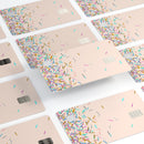Multicolor Birth Sprinkles Over Tan - Premium Protective Decal Skin-Kit for the Apple Credit Card