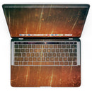 MacBook Pro with Touch Bar Skin Kit - Orange_Scratched_Surface_with_Gold_Beams-MacBook_13_Touch_V4.jpg?
