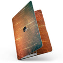 MacBook Pro with Touch Bar Skin Kit - Orange_Scratched_Surface_with_Gold_Beams-MacBook_13_Touch_V7.jpg?