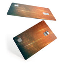 Orange Scratched Surface with Gold Beams - Premium Protective Decal Skin-Kit for the Apple Credit Card