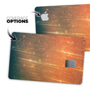Orange Scratched Surface with Gold Beams - Premium Protective Decal Skin-Kit for the Apple Credit Card