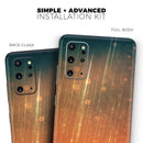 Orange Scratched Surface with Gold Beams - Premium Vinyl Skin Decal for Samsung Galaxy S25 Ultra, S24, S23, S22 & All Galaxy S Models