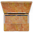 MacBook Pro with Touch Bar Skin Kit - Orange_Tribal_Arrow_Pattern-MacBook_13_Touch_V4.jpg?