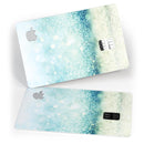 Teal and Aqua Unfocused Sparkling Orbs - Premium Protective Decal Skin-Kit for the Apple Credit Card