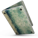 MacBook Pro with Touch Bar Skin Kit - Teal_and_Gold_Unfocused_Orbs_of_Light-MacBook_13_Touch_V6.jpg?