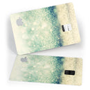 Teal and Gold Unfocused Orbs of Light - Premium Protective Decal Skin-Kit for the Apple Credit Card