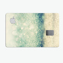 Teal and Gold Unfocused Orbs of Light - Premium Protective Decal Skin-Kit for the Apple Credit Card