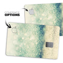 Teal and Gold Unfocused Orbs of Light - Premium Protective Decal Skin-Kit for the Apple Credit Card
