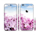 The Blue Sky Pink Flower Field Sectioned Skin Series for the Apple iPhone 6