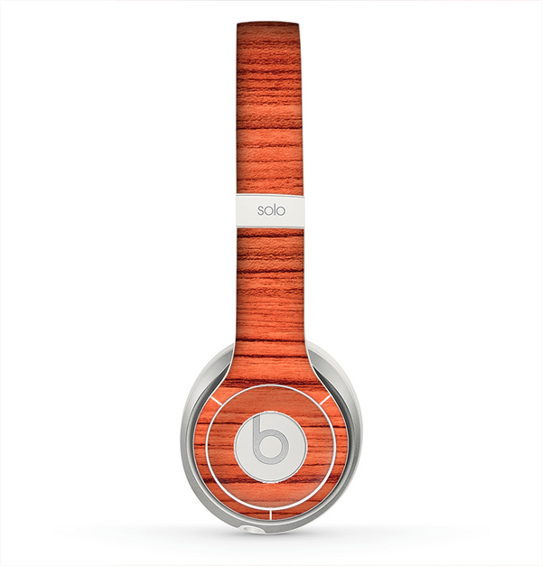 The Bright Red & Black Grained Wood Skin for the Beats by Dre Solo 2 Headphones