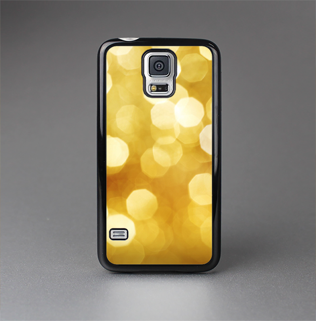 The Glistening Golden Unfocused Light Speckles Skin-Sert Case for the Samsung Galaxy S5