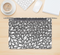 The Gray & White Floral Sprout Skin Kit for the 12" Apple MacBook (A1534)