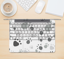 The Gray & White Large Paw Prints Skin Kit for the 12" Apple MacBook (A1534)