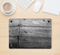 The Gray Worn Wooden Planks Skin Kit for the 12" Apple MacBook (A1534)