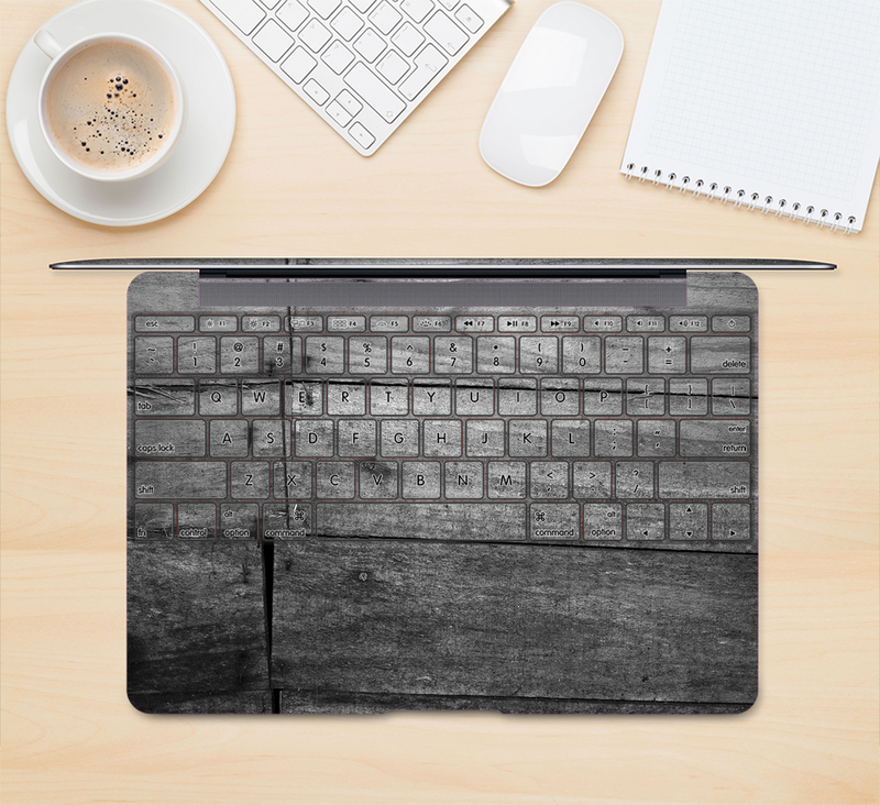 The Gray Worn Wooden Planks Skin Kit for the 12" Apple MacBook (A1534)
