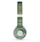 The Green Tinted Wood Planks Skin for the Beats by Dre Solo 2 Headphones