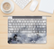The Grunge White & Gray Texture Skin Kit for the 12" Apple MacBook (A1534)