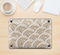The Layered Tan Circle Pattern Skin Kit for the 12" Apple MacBook (A1534)