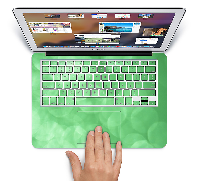 The Light Green Unfocused Orbs Skin Set for the Apple MacBook Pro 15" with Retina Display